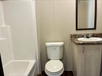 2023 166032A  Home