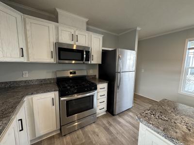 Photo 5 of 39 of home located at 2022 Marmoor Dr #26 Shelby Township, MI 48317