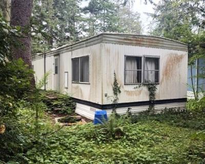 Mobile Home at 89510 HWY 101 Sp. #12 Florence, OR 97439