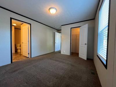 Photo 2 of 11 of home located at 57428 Woodcreek New Haven, MI 48048
