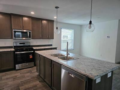 Photo 2 of 9 of home located at 128 Aqua Rockford, MN 55373