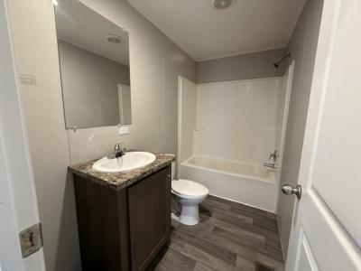 Photo 4 of 12 of home located at 424 Jack Pine Circle Flint, MI 48506