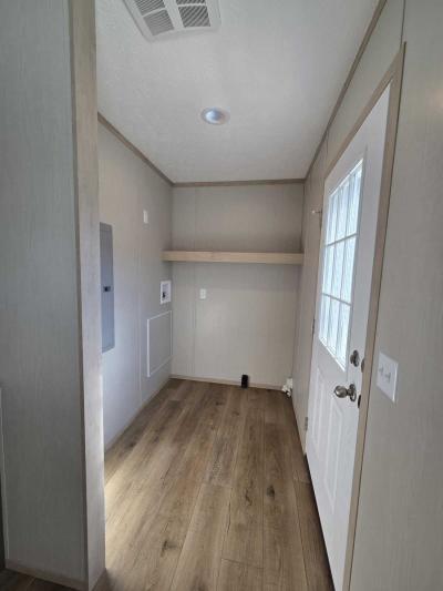 Photo 2 of 17 of home located at 8811 NE 107th St. #104 Kansas City, MO 64157