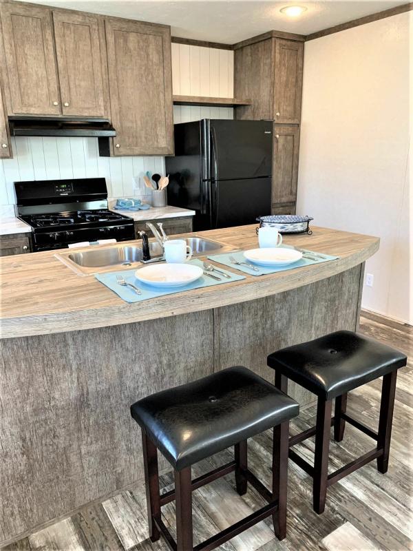 Photo 1 of 2 of home located at 1908 E 19th St. Lot W-30 Lot W030 Lawrence, KS 66046