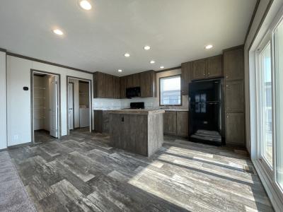 Photo 2 of 12 of home located at 7204 East Grand River Ave Lot 466 Portland, MI 48875