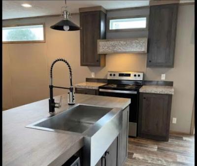 Photo 3 of 8 of home located at 9009 Kaill Rd. Trlr # 24 Pleasant Valley, MO 64068