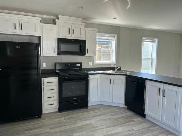 Photo 1 of 2 of home located at 1908 E 19th St. Lot W-26 Lot W026 Lawrence, KS 66046
