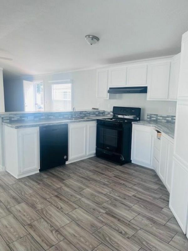 Photo 1 of 2 of home located at 1908 E 19th St. Lot E-153 Lot E153 Lawrence, KS 66046