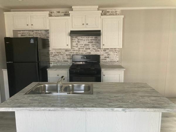 Photo 1 of 2 of home located at 21409 Carousel Drive N., Site #148 Macomb, MI 48044