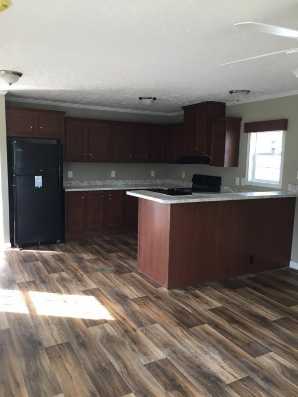 Photo 1 of 2 of home located at 724 Creek Ridge Road #185 Greensboro, NC 27406