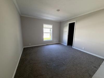 Photo 4 of 5 of home located at 13216 Pinewood Drive Grand Haven, MI 49417