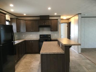 Photo 2 of 6 of home located at 3394 Elm Brook Burton, MI 48519