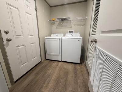 Photo 2 of 11 of home located at 115 Emory Oak Drive Coopersville, MI 49404
