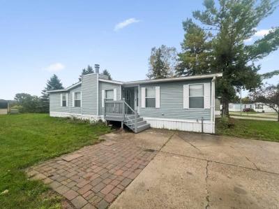 Photo 2 of 29 of home located at 4139 Clement Street Milford, MI 48381