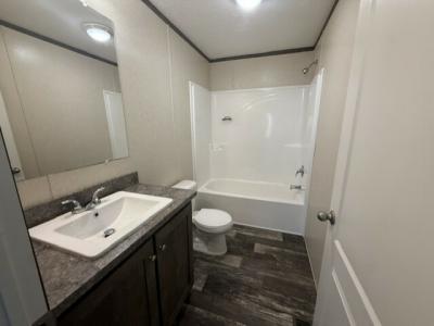 Photo 4 of 12 of home located at 980 Estate Drive Flint, MI 48506