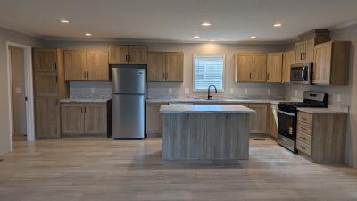 Photo 2 of 10 of home located at 235 W Ross Ct Highland, MI 48357