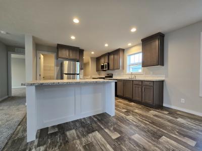 Photo 1 of 11 of home located at 7204 East Grand River Ave Lot 461 Portland, MI 48875