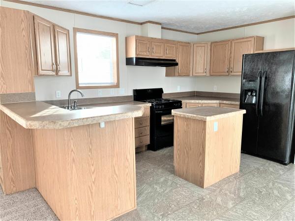 Photo 1 of 2 of home located at 46075 Chateau Thierry, Site #406 Macomb, MI 48044