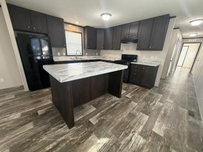 Photo 4 of 25 of home located at 38066 Versailles #65 Clinton Township, MI 48038