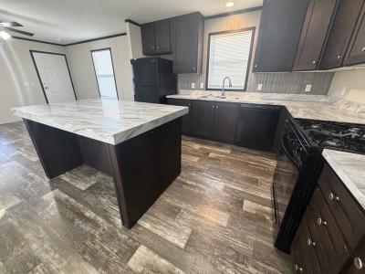 Photo 5 of 25 of home located at 38066 Versailles #65 Clinton Township, MI 48038