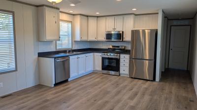 Photo 2 of 7 of home located at 217 Norman Dr Highland, MI 48357