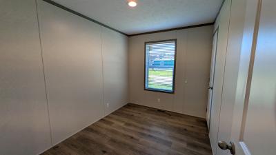 Photo 5 of 7 of home located at 217 Norman Dr Highland, MI 48357