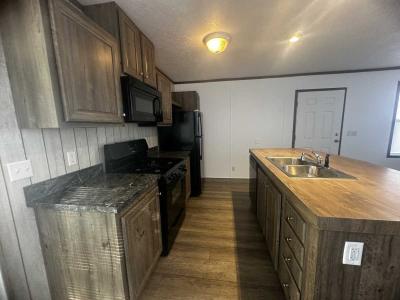 Photo 2 of 8 of home located at 23 Loch Loma Mount Morris, MI 48458