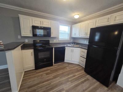 Photo 5 of 16 of home located at 8813 NE 106th Pl. #124 Kansas City, MO 64157