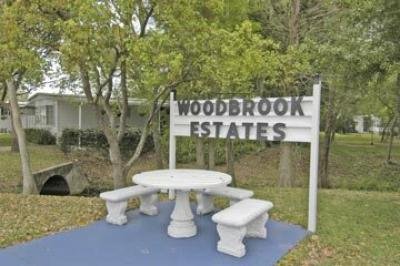 Newby Realty at Woodbrook Estates mobile home dealer with manufactured homes for sale in Lakeland, FL. View homes, community listings, photos, and more on MHVillage.